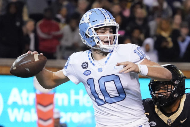 North Carolina quarterback Drake Maye (10) looks to pass against Wake Forest during the first half of an NCAA college football game in Winston-Salem, N.C., Saturday, Nov. 12, 2022. (AP Photo/Chuck Burton)