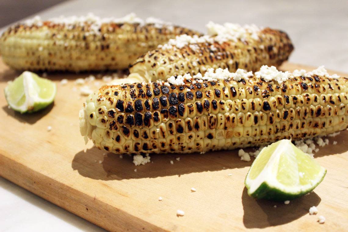 Mazunte has grilled corn on the menu, served with dried chile, aoli, lime and queso.