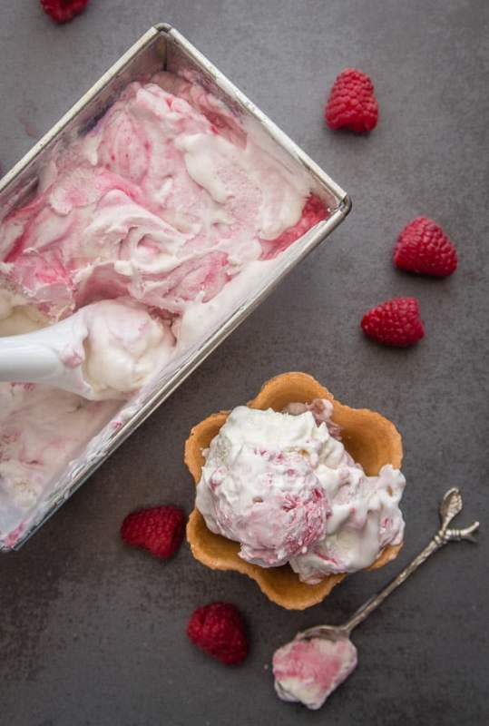 <p>Raspberry swirl ice cream is a creamy no-churn ice cream, made with fresh raspberries. The perfect summer treat! Fast, easy and so delicious.</p><p><strong>Get the recipe: <a href="https://anitalianinmykitchen.com/raspberry-swirl-ice-cream/" rel="nofollow noopener" target="_blank" data-ylk="slk:Raspberry Swirl Ice Cream;elm:context_link;itc:0;sec:content-canvas" class="link ">Raspberry Swirl Ice Cream</a></strong></p>