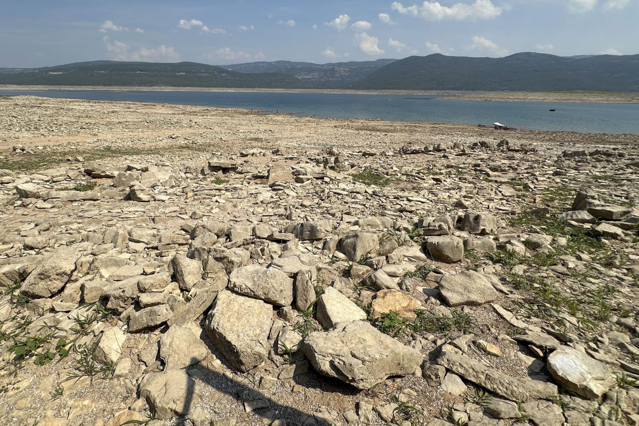 The dried up Bileca lake, near the town of Bileca, Bosnia, Thursday, Sept. 5, 2024. Experts say the summer of 2024 in the Balkans was the hottest since measurements started more than 130 years ago. (AP Photo/Eldar Emric)