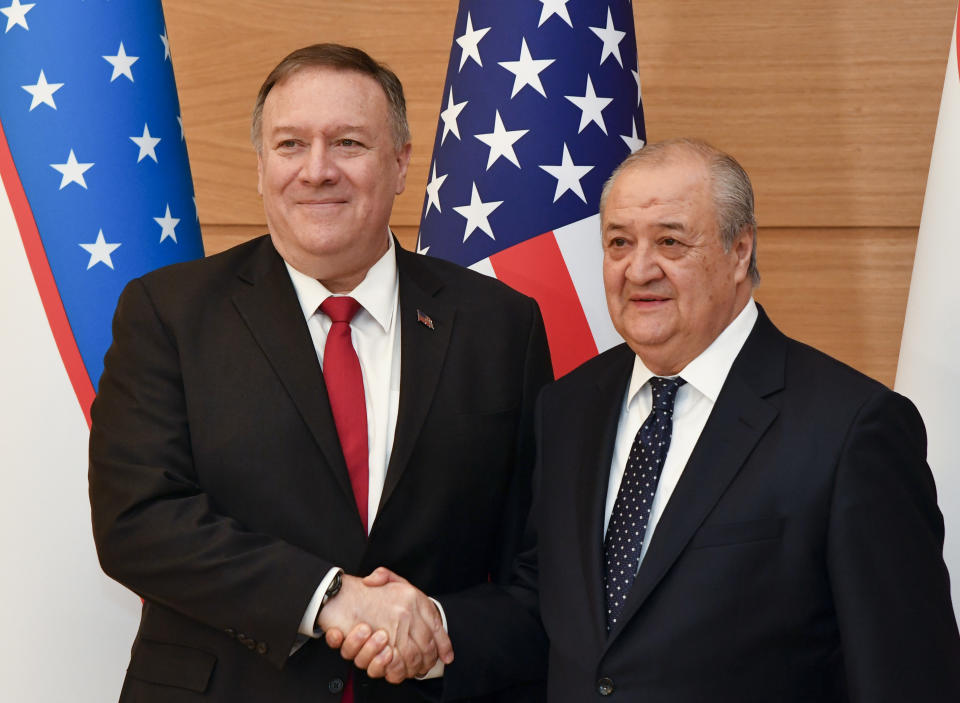 U.S. Secretary of State Mike Pompeo, left, and Uzbekistan's Foreign Minister Abdulaziz Kamilov pose for a photo prior to their talks in Tashkent, Uzbekistan, Monday, Feb. 3, 2020. (AP Photo)