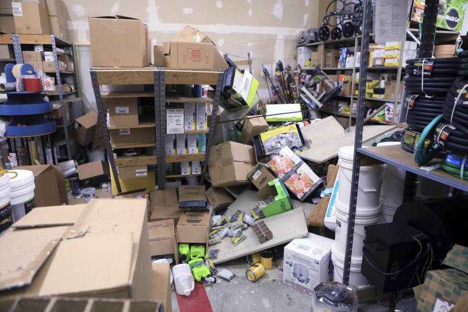 Items from two shelves that came unbolted from a wall are strewn across the floor of the stock room of Anchorage True Value Hardware following an earthquake Friday morning, Nov. 30, 2018, in Anchorage, Alaska. (Photo: Dan Joling/AP)