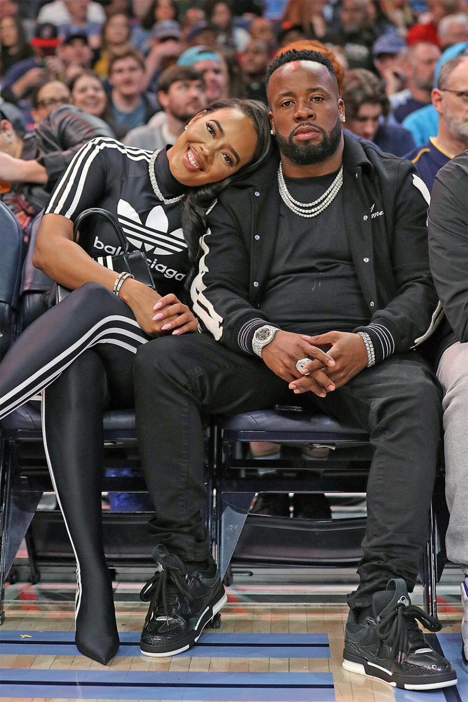 MEMPHIS, TENNESSEE - JANUARY 18: (L-R) Angela Simmons and Yo Gotti attend the game between the Memphis Grizzlies and the Cleveland Cavaliers at FedExForum on January 18, 2023 in Memphis, Tennessee. NOTE TO USER: User expressly acknowledges and agrees that, by downloading and or using this photograph, User is consenting to the terms and conditions of the Getty Images License Agreement. (Photo by Justin Ford/Getty Images)