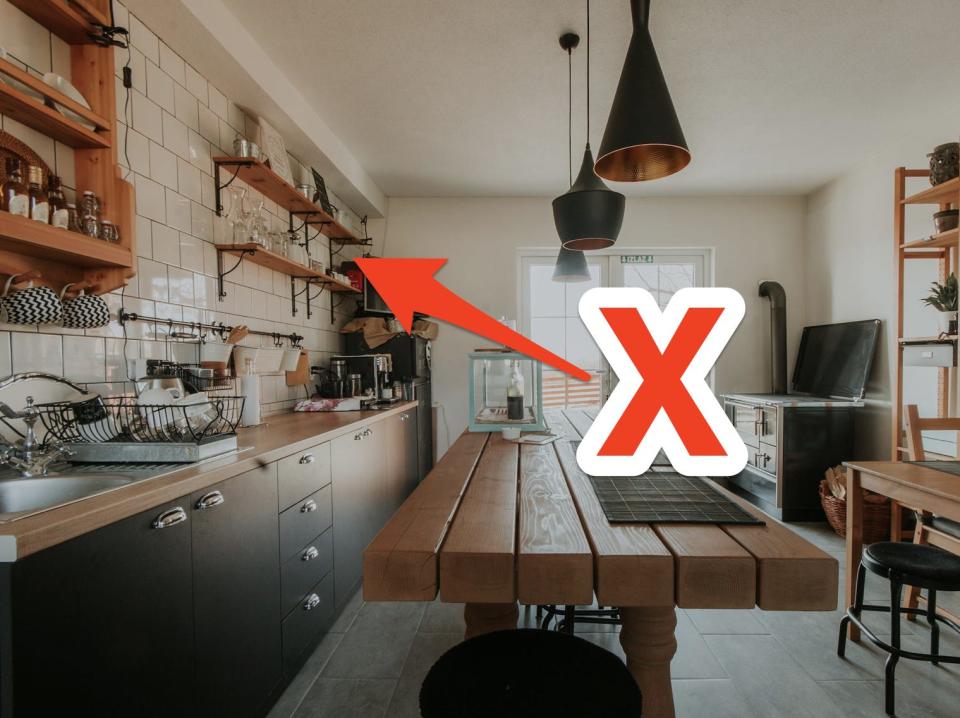 red arrow and x pointing at open kitchen shelving