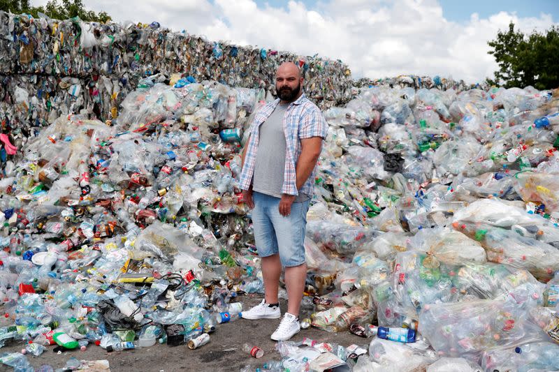 Wetter, 38-year-old, poses for a picture at a garbage disposal dump during the global coronavirus disease (COVID-19) outbreak, in Erd