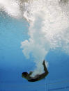 Jennifer Abel of Canada dives during women's 3-meter springboard diving finals at the Aquatics Centre in the Olympic Park during the 2012 Summer Olympics in London, Sunday, Aug. 5, 2012. Abel took sixth in the event. (AP Photo/Mark J. Terrill)