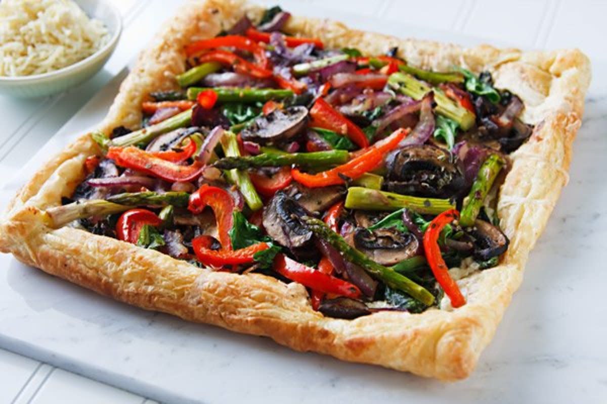 <p>The Vegan Atlas</p><p>This vegan vegetable tart is practically effortless to make and gorgeous to behold. This recipe makes two generous rectangular tarts, and is a festive offering for a vegan Easter menu, Mother’s Day, or any springtime occasion.</p><p><strong>Get the recipe: <a href="https://theveganatlas.com/vegan-spring-vegetable-tart/" rel="nofollow noopener" target="_blank" data-ylk="slk:Vegan Vegetable Tart;elm:context_link;itc:0;sec:content-canvas" class="link rapid-noclick-resp">Vegan Vegetable Tart</a></strong></p>