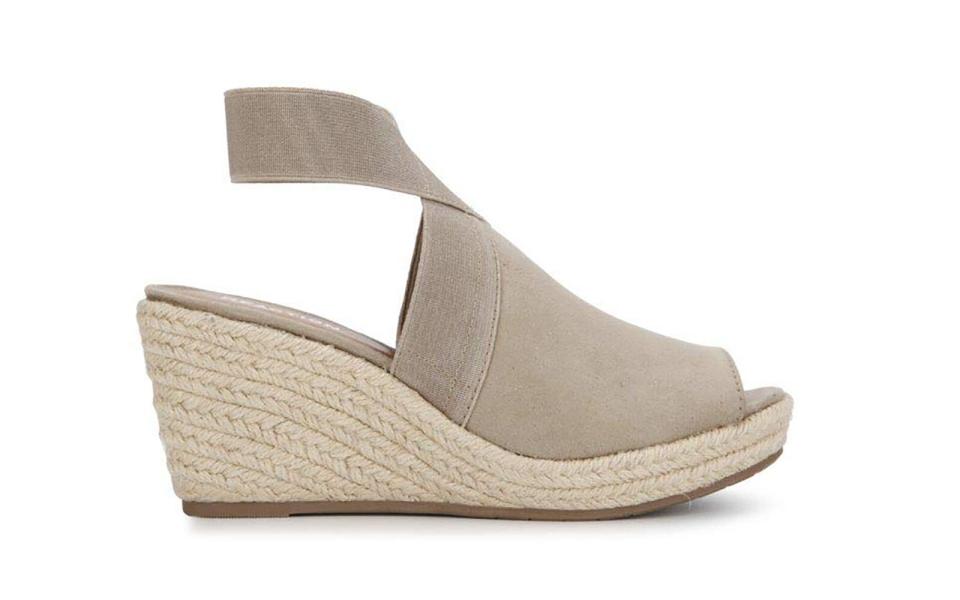 <p>These stylish espadrilles from Kenneth Cole Reaction may look like your basic wedge sandal, but they actually include smart features that make them some of the most comfortable shoes around. Along with a soft, padded insole and breathable faux-leather inner lining, hey also boast a rubber outsole for added traction and stability. One rave review said, “Love these shoes. Super cute, comfortable and stylish too. Don’t pass them up. Look good with shorts, jeans and even the right dress.”</p> <p>To buy: <a href="https://www.amazon.com/gp/product/B07MFRPK5M/ref=as_li_tl?ie=UTF8&camp=1789&creative=9325&creativeASIN=B07MFRPK5M&linkCode=as2&tag=tlcomfyheelsrcarhart319-20&linkId=06ce3d14957832235e0adfd3b6308d31" rel="nofollow noopener" target="_blank" data-ylk="slk:amazon.com;elm:context_link;itc:0;sec:content-canvas" class="link ">amazon.com</a>, from $89</p>