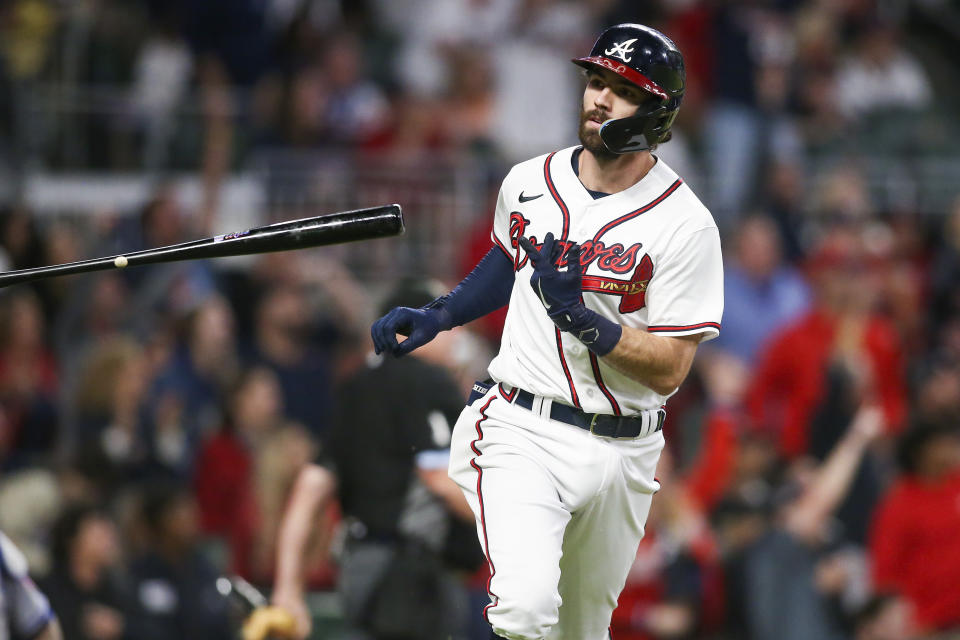 Atlanta Braves' Dansby Swanson celebrates after a two-run home run in the fifth inning of a baseball game against the New York Mets, Saturday, Oct. 1, 2022, in Atlanta. (AP Photo/Brett Davis)