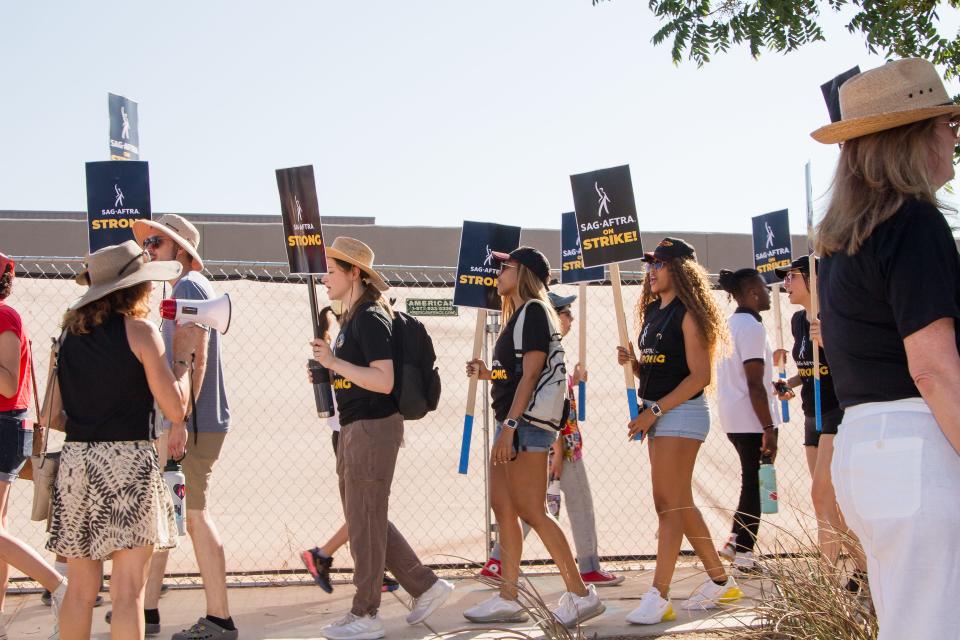 Members of the New Mexico chapter of the Screen Actors Guild – American Federation of Television and Radio Artists (SAG-AFTRA) – labor union participate in a demonstration in Albuquerque on July 26, 2023 during the ongoing nationwide strike.