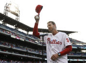 FILE - In this Aug. 8, 2014, file photo, former Philadelphia Phillies' Roy Halladay acknowledges the crowd before a baseball game against the New York Mets, in Philadelphia. The late Roy Halladay will be inducted into the Baseball Hall of Fame on Sunday, July 21, 2019. (AP Photo/Matt Slocum, File)