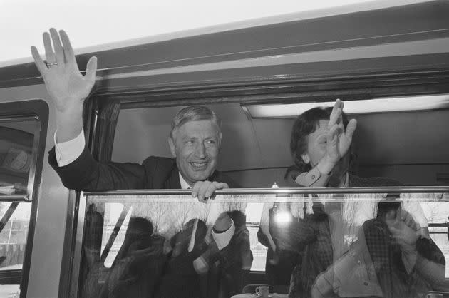 Former Prime Minister Dries van Agt, shown here with his wife, Eugenie van Agt-Krekelberg, as they leave Amsterdam on April 14, 1987, to begin his post as ambassador of the European Union to Japan.