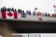 <p>Protestors show their support for the Freedom Convoy of truck drivers who are making their way to Ottawa to protest against COVID-19 vaccine mandates by the Canadian government on Thursday, Jan. 27, 2022, in Vaughan. (Photo by Arthur Mola/Invision/AP)</p> 