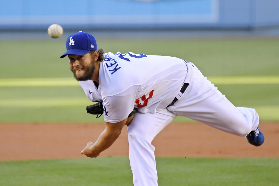 Los Angeles Dodgers starting pitcher Clayton Kershaw watches a throw during the first inning of the team's baseball game against the San Francisco Giants on Saturday, Aug. 8, 2020, in Los Angeles. (AP Photo/Mark J. Terrill)