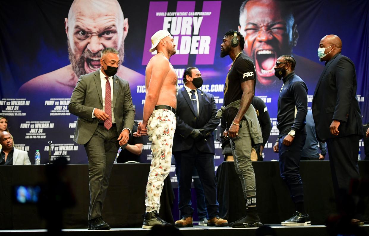 Boxers Tyson Fury and Deontay Wilder face-off in anticipation of their third fight.