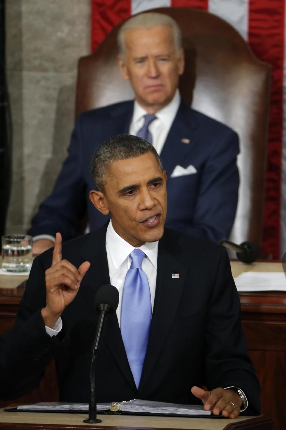 Vice President Joe Biden listens as President Barack Obama gives his State of the Union address on Capitol Hill in Washington, Tuesday Jan. 28, 2014. (AP Photo/Charles Dharapak)