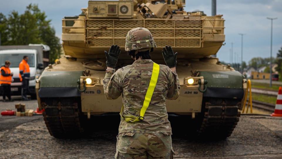 U.S. soldiers offload M1A1 Abrams tanks needed for training Ukrainian forces at Grafenwoehr, Germany, on May 14, 2023. (Spc. Christian Carrillo/U.S. Army)