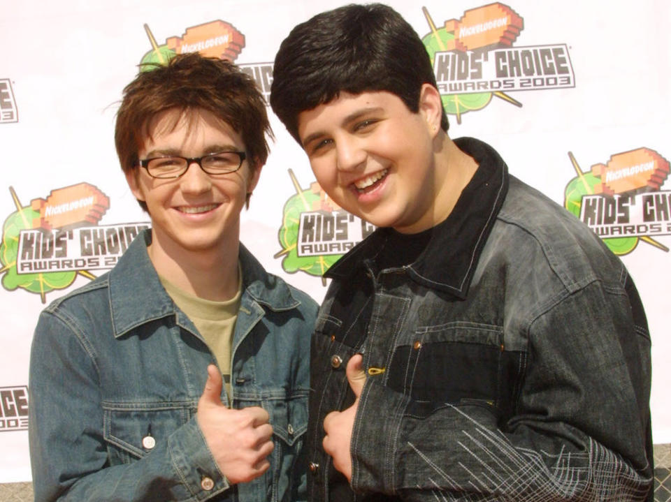 SANTA MONICA, CA - APRIL 12:  Actors Drake Bell and Josh Peck of the "Drake and Josh" show pose during arrivals for Nickelodeon's 16th Annual Kids' Choice Awards at the Barker Hangar April 12, 2003 in Santa Monica, California.  (Photo by Frederick M. Brown/Getty Images)