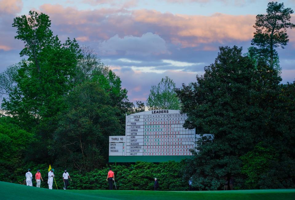 Apr 11, 2024; Augusta, Georgia, USA; Jordan Spieth, Ludvig Aberg and Sahith Theegala putt on No. 11 during the first round of the Masters Tournament. Mandatory Credit: Katie Goodale-USA TODAY Network