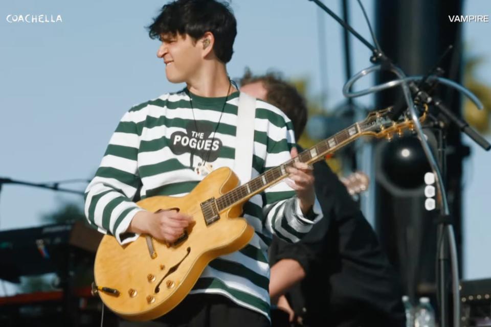 Vampire Weekend frontman Ezra Koenig wearing a ‘The Pogues’ shirt onstage at Coachella 2024 (YouTube)