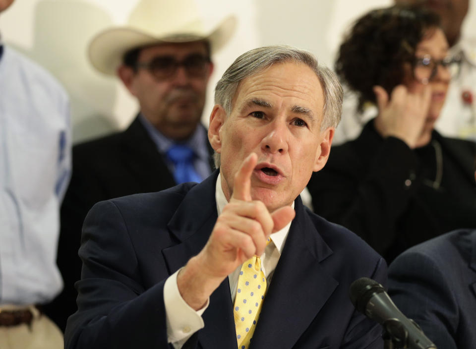 FILE - In this March 16, 2020, file photo, Texas Gov. Greg Abbott is joined by state and city officials as he gives an update on the coronavirus outbreak in San Antonio. A federal appeals court sided Tuesday, April 7, 2020, with Texas in allowing it to ban most abortions while the state is under an emergency order that limits non-essential surgeries during the coronavirus pandemic. (AP Photo/Eric Gay, File)