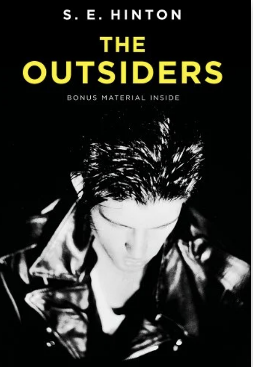 Cover of "The Outsiders" by S.E. Hinton, featuring a person in a leather jacket