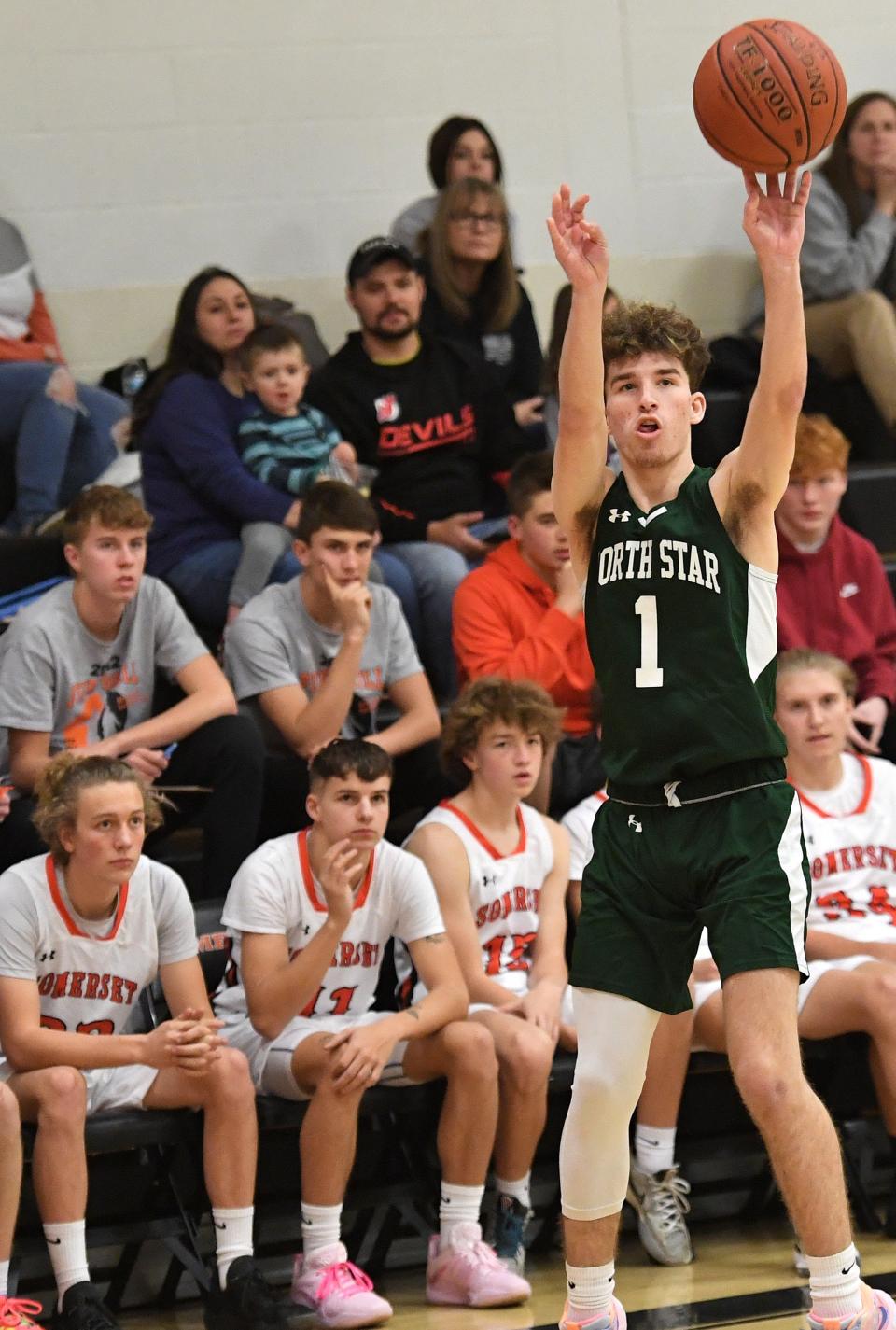 North Star's Brady Weimer drains a three-pointer in front of the Somerset bench during the championship game of the Pine Grill Roundball Classic, Dec. 3, in Somerset.