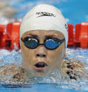 US swimmer Natalie Coughlin competes in the heats of the women's 100-metre backstroke swimming event in the FINA World Championships at the indoor stadium of the Oriental Sports Center in Shanghai on July 25, 2011. AFP PHOTO / FRANCOIS XAVIER MARIT (Photo credit should read FRANCOIS XAVIER MARIT/AFP/Getty Images)