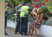 <p>She and her friend were spoken to by a couple of less than impressed officers.</p>