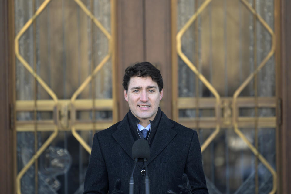 Prime Minister Justin Trudeau addresses the media in Ottawa, Ontario on Monday, Jan. 14, 2019. A Chinese court sentenced Robert Lloyd Schellenberg, a Canadian man to death Monday in a sudden retrial in a drug smuggling case. Trudeau said he is extremely concerned that China chose to "arbitrarily" apply the death penalty to a Canadian citizen. (Adrian Wyld/The Canadian Press via AP)