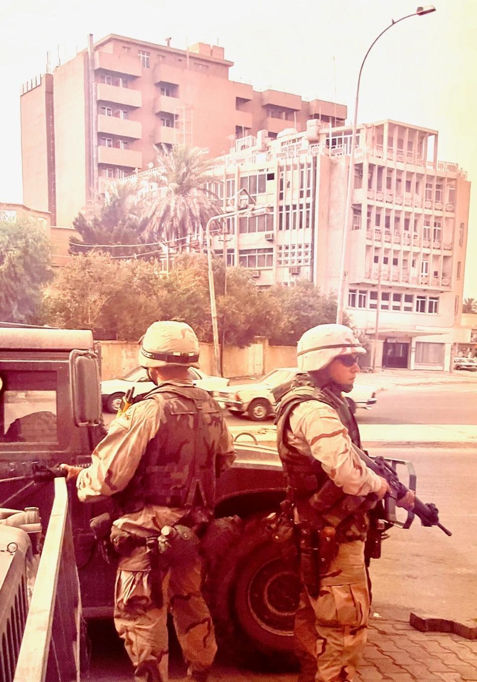 Scott Spitnale, right, during his U.S. Special Forces tour in Baghdad from 2003-2004.