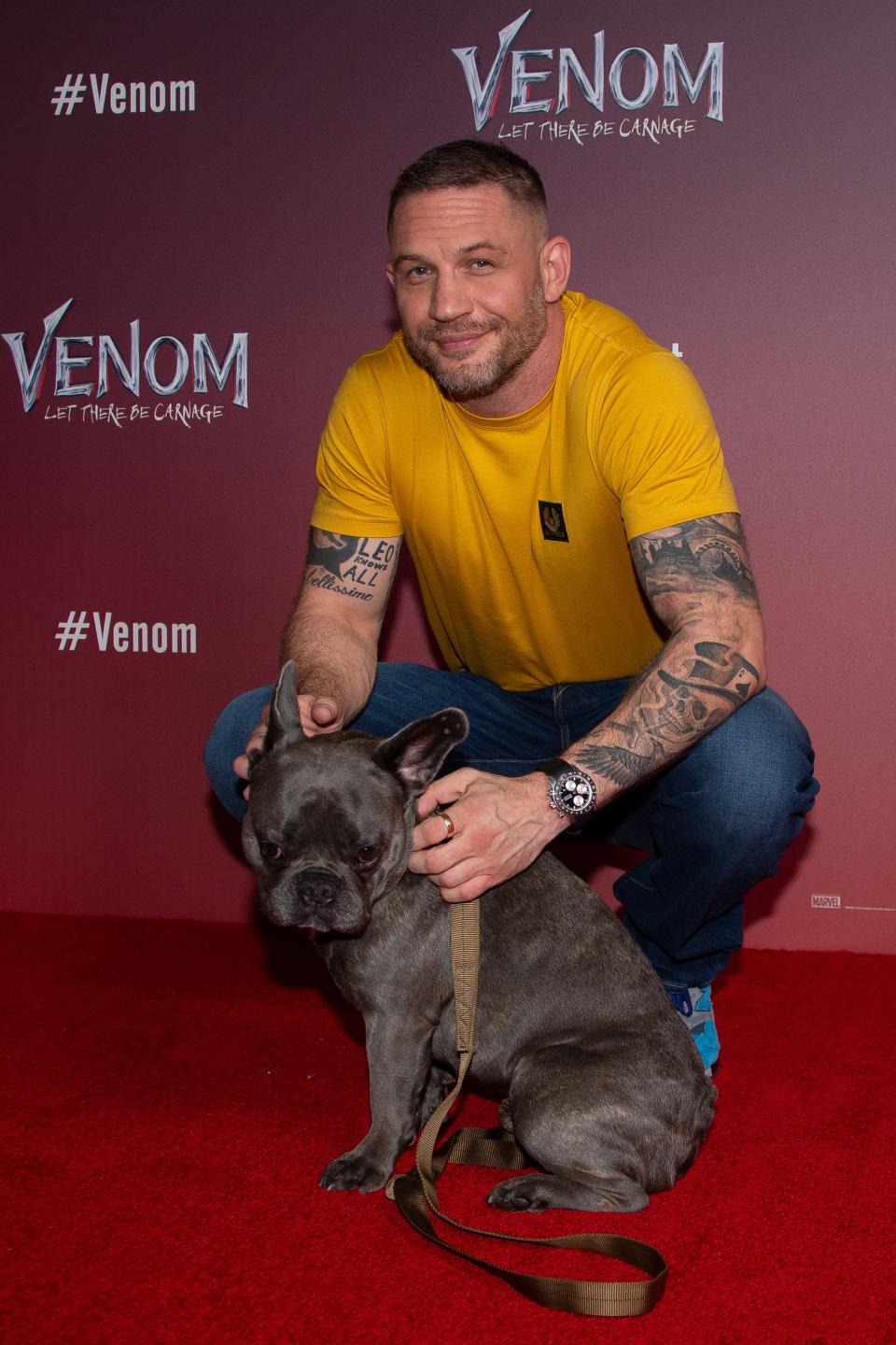 Tom Hardy brought his dog Blue to a London photo call for "Venom: Let There Be Carnage" on Sept. 14, 2021.