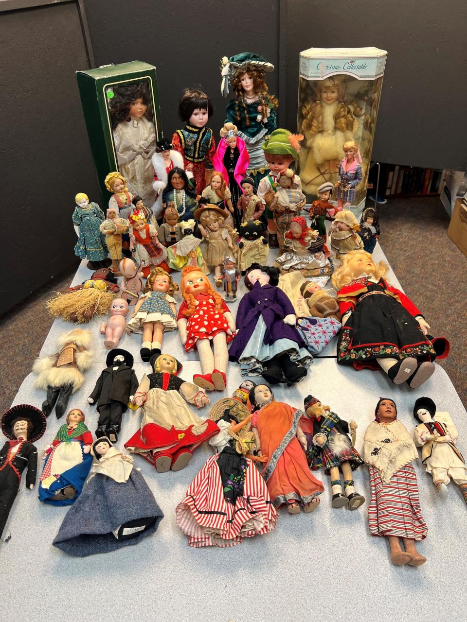 Dolls collected from world travel, as well as Barbie dolls, are among more than 300 that will be auctioned by the Center for Active Adults in South Lyon.
