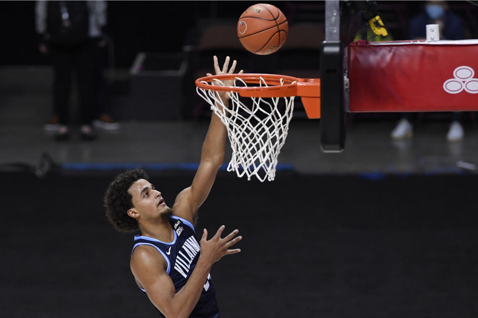 Villanova's Jeremiah Robinson-Earl goes up for a basket during the first half of the team's NCAA college basketball game against Boston College, Wednesday, Nov. 25, 2020, in Uncasville, Conn. (AP Photo/Jessica Hill)