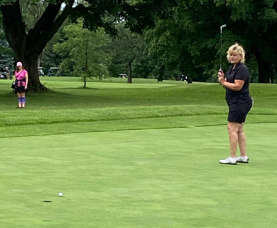 Lori Horan watches a birdie putt attempt at Erskine Park's 292-yard eighth hole during Thursday's final round of the 96th South Bend Women's Metro golf championships. Horan ended up with a par on the hole but birdied the ninth hole in a final-round 75 that was good for an eight-stroke victory.