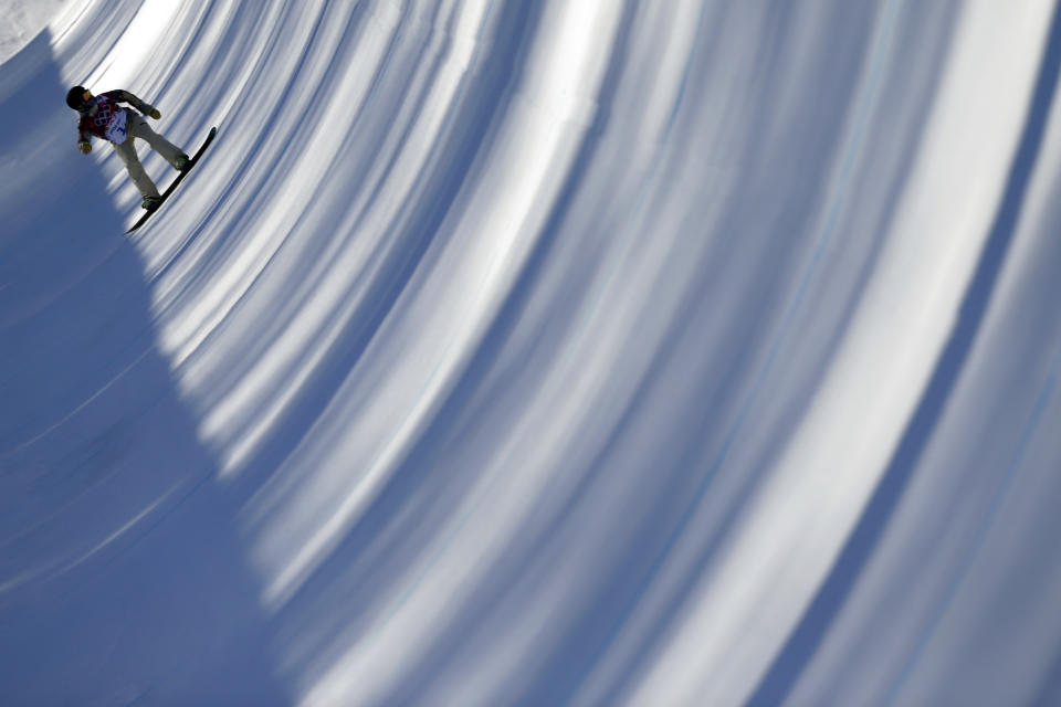 Kelly Clark of the United States trains for the women's snowboard halfpipe competition at the 2014 Winter Olympics, Saturday, Feb. 8, 2014, in Krasnaya Polyana, Russia.