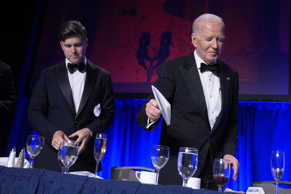 President Joe Biden, right, and host Colin Jost attend the White House Correspondents' Association Dinner at the Washington Hilton, Saturday, April 27, 2024, in Washington. (AP Photo/Manuel Balce Ceneta)