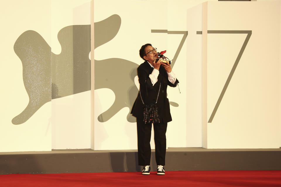 Director Ann Hui holds her Golden Lion award for Lifetime Achievement during the 77th edition of the Venice Film Festival in Venice, Italy, Tuesday, Sept. 8, 2020. (Photo by Joel C Ryan/Invision/AP)