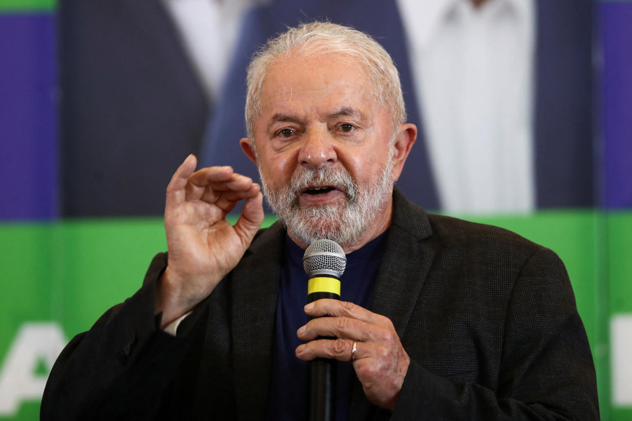 Luiz Inácio Lula da Silva at the microphone.
