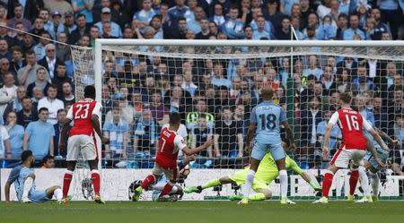 Britain Football Soccer - Arsenal v Manchester City - FA Cup Semi Final - Wembley Stadium - 23/4/17 Arsenal's Alexis Sanchez scores their second goal Action Images via Reuters / John Sibley Livepic