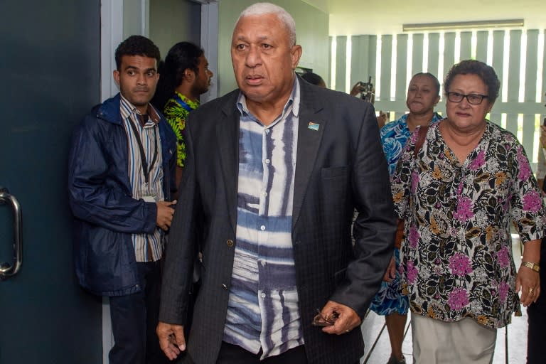 This file picture taken on February 7, 2024 shows Fiji's former prime minister Frank Bainimarama leaving the Magistrates Court in Suva, Fiji (LEON LORD)