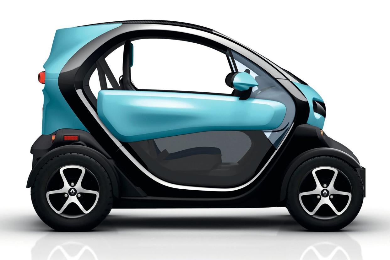 Sky blue and black Renault Twizy on white background