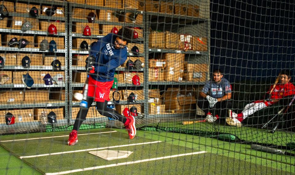 David Hamilton swings the bat in the cage on the first day of practice at Polar Park Tuesday.