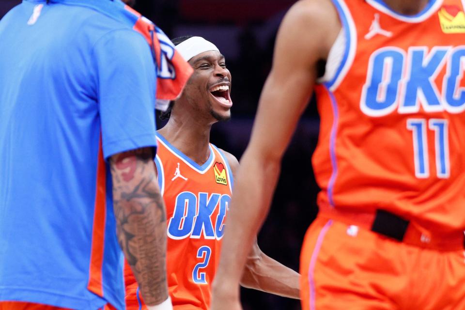 Thunder guard Shai Gilgeous-Alexander (2) celebrates after Jalen Williams made the go-ahead basket in the final seconds of OKC's 111-109 win against the Trail Blazers on Tuesday night at Paycom Center.