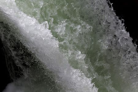 Water falls at the Trasandino tunnel of Peruvian state water company Sedapal, is seen in Junin, Peru, August 17, 2017. Picture taken August 17, 2017. REUTERS/Guadalupe Pardo