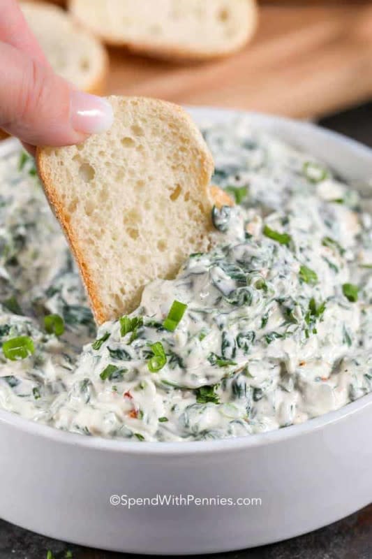 <p>Spend With Pennies</p><p>This dip has a secret ingredient for extra flavor and crunch: water chestnuts!</p><p><strong>Get the recipe:<a href="https://www.spendwithpennies.com/lightened-spinach-dip/" rel="nofollow noopener" target="_blank" data-ylk="slk:Easy Spinach Dip;elm:context_link;itc:0;sec:content-canvas" class="link rapid-noclick-resp"> Easy Spinach Dip</a></strong></p>