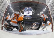 PITTSBURGH, PA - APRIL 20: Scott Hartnell #19 of the Philadelphia Flyers clears the puck from the crease as Ilya Bryzgalov #30 protects the net against the Pittsburgh Penguins in Game Five of the Eastern Conference Quarterfinals during the 2012 NHL Stanley Cup Playoffs at Consol Energy Center on April 20, 2012 in Pittsburgh, Pennsylvania. (Photo by Justin K. Aller/Getty Images)