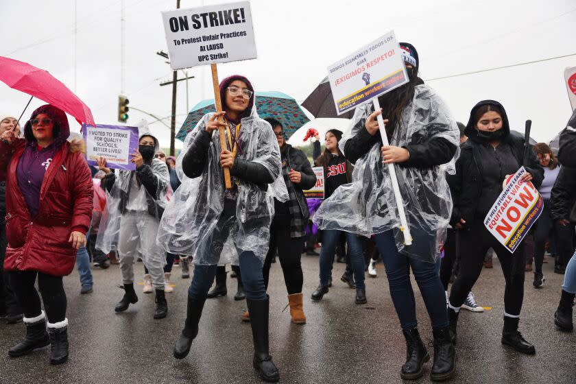 LOS ANGELES, CALIFORNIA - MARCH 22: Los Angeles Unified School District (LAUSD) workers and supporters dance at a rally outside a LAUSD district office on the second day of a strike over a new contract on March 22, 2023 in Los Angeles, California. Tens of thousands of public school employees including bus drivers, food service workers, custodians and teacher aides are taking part in a three-day strike, calling for fair wages and benefits, which has left 420,000 students out of school in the second largest school system in the U.S. (Photo by Mario Tama/Getty Images)