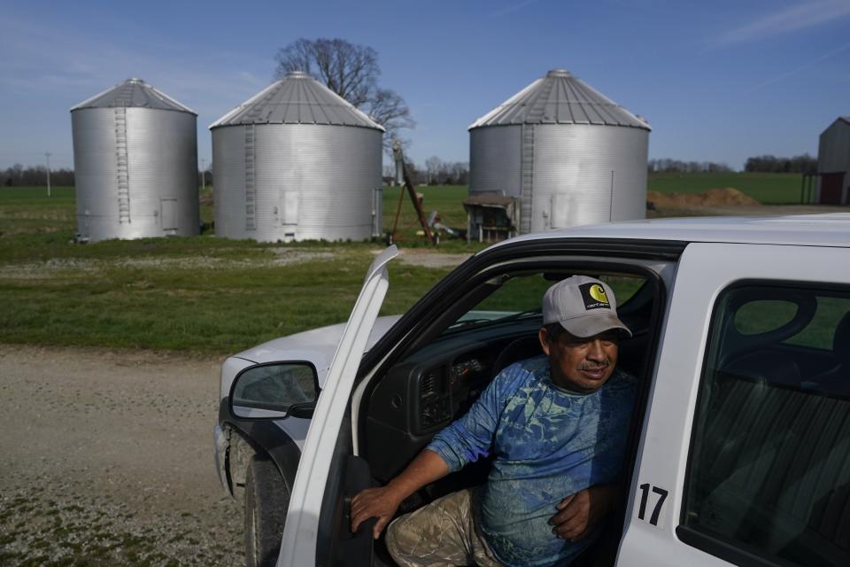 Fernando Osorio Loya, a contract worker from Veracruz, Mexico, sits inside a truck Tuesday, March 12, 2024, at a farm in Crofton, Ky. The latest U.S. agricultural census data shows an increase in the proportion of farms utilizing contract labor compared to those hiring labor overall. (AP Photo/Joshua A. Bickel)