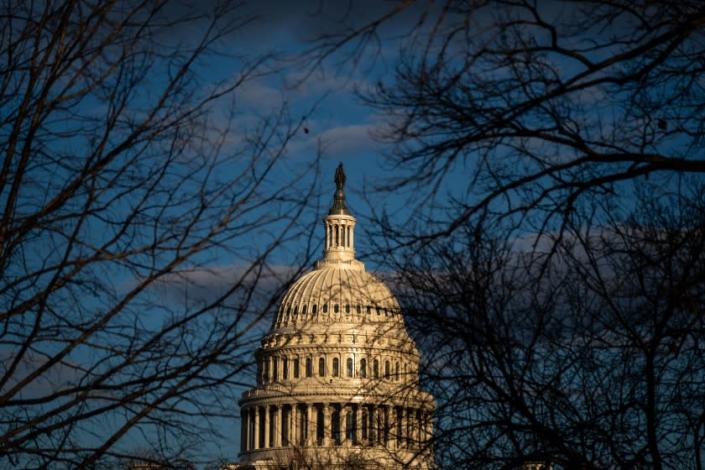 WASHINGTON, DC - JANUARY 18: The dome of the U.S. Capitol Building is bathed in afternoon light on Monday, Jan. 18, 2021 in Washington, DC. After last week&#39;s riots and security breach at the U.S. Capitol Building, the FBI has warned of additional threats in the nation&#39;s capital and across all 50 states. (Kent Nishimura / Los Angeles Times)